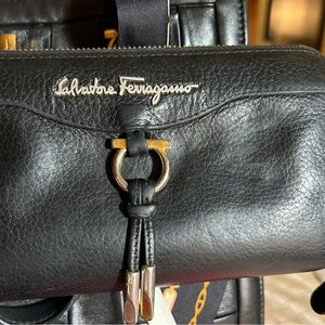Salvatore Ferragamo black leather zip around continental wallet